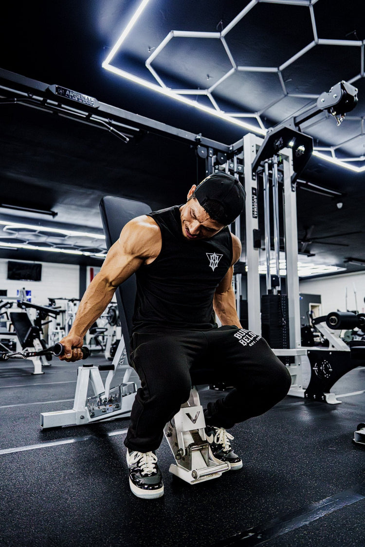 Training in Built Below Origin Sweats on a cable row